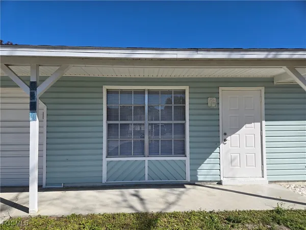 a view of a house with a garage