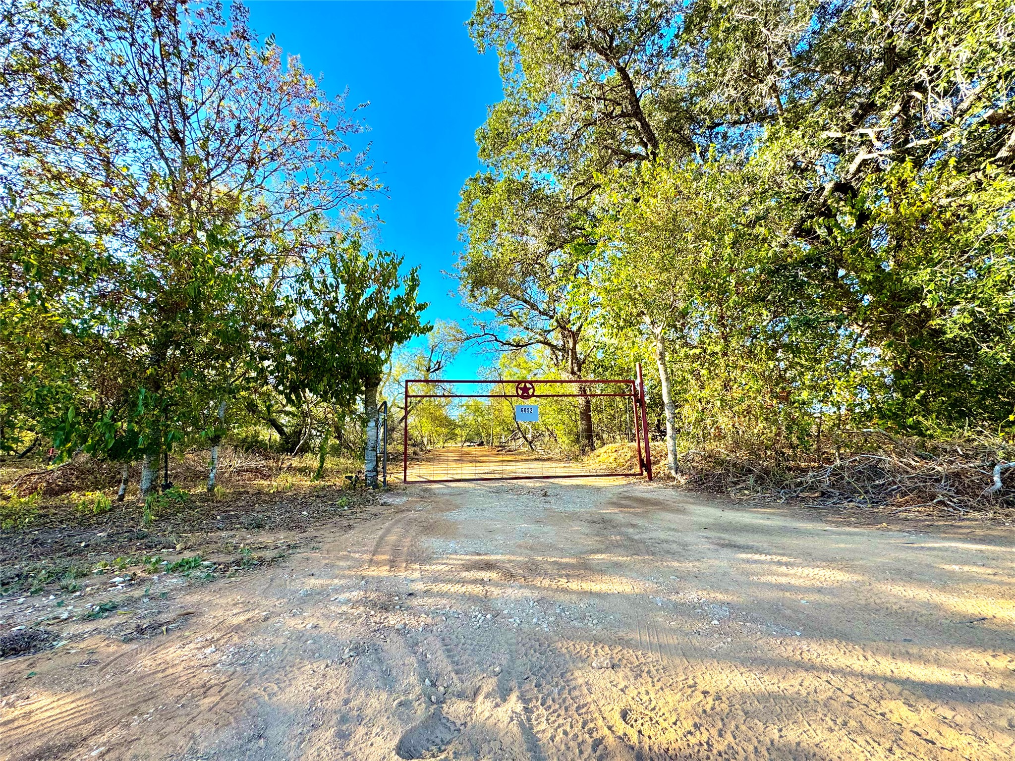 6052 Tenney Creek Road Luling, TX 78648 - Photo 2 of 22 View of gate