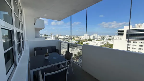 a kitchen with a sink cabinets and appliances