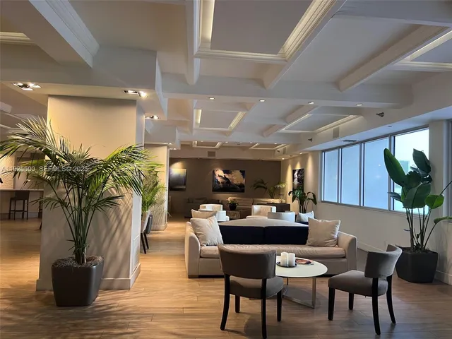 a kitchen with a table and chairs in it