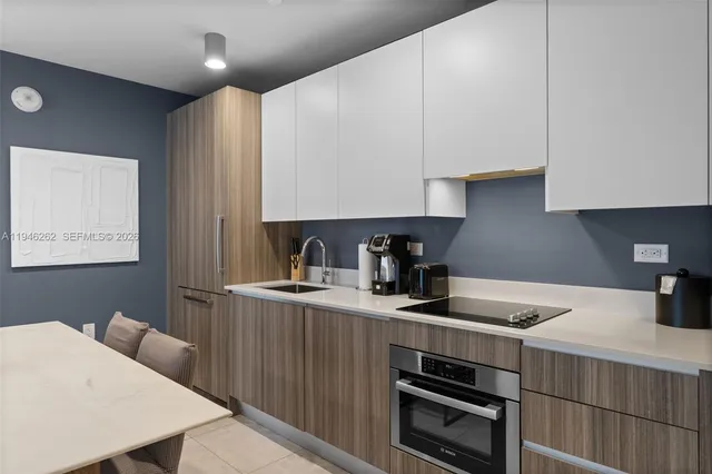 a view of an empty room with a sliding door