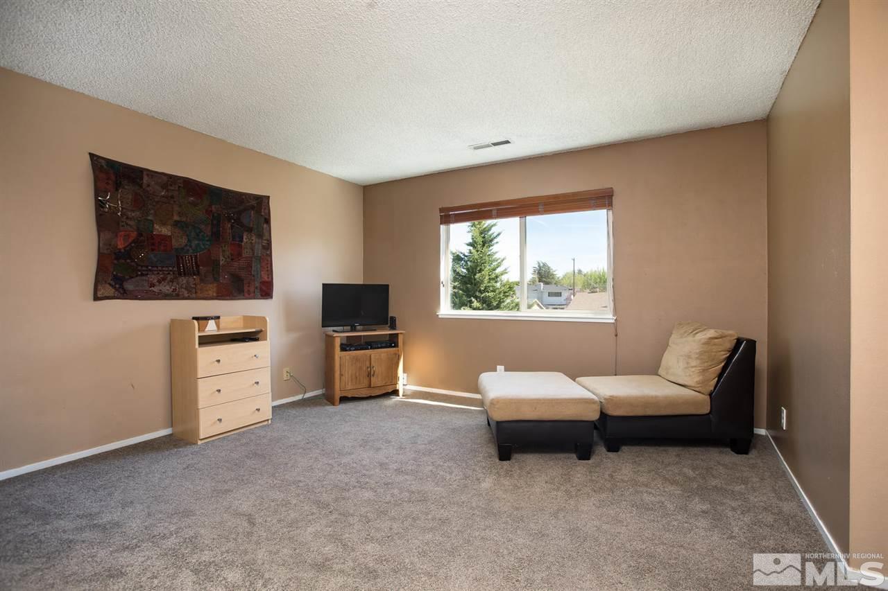 1845 Kings Row Reno, NV 89503 - Photo 11 of 25 a living room with furniture and a flat screen tv
