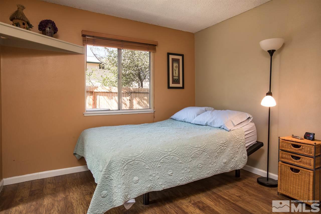1845 Kings Row Reno, NV 89503 - Photo 17 of 25 a bedroom with a bed and a window