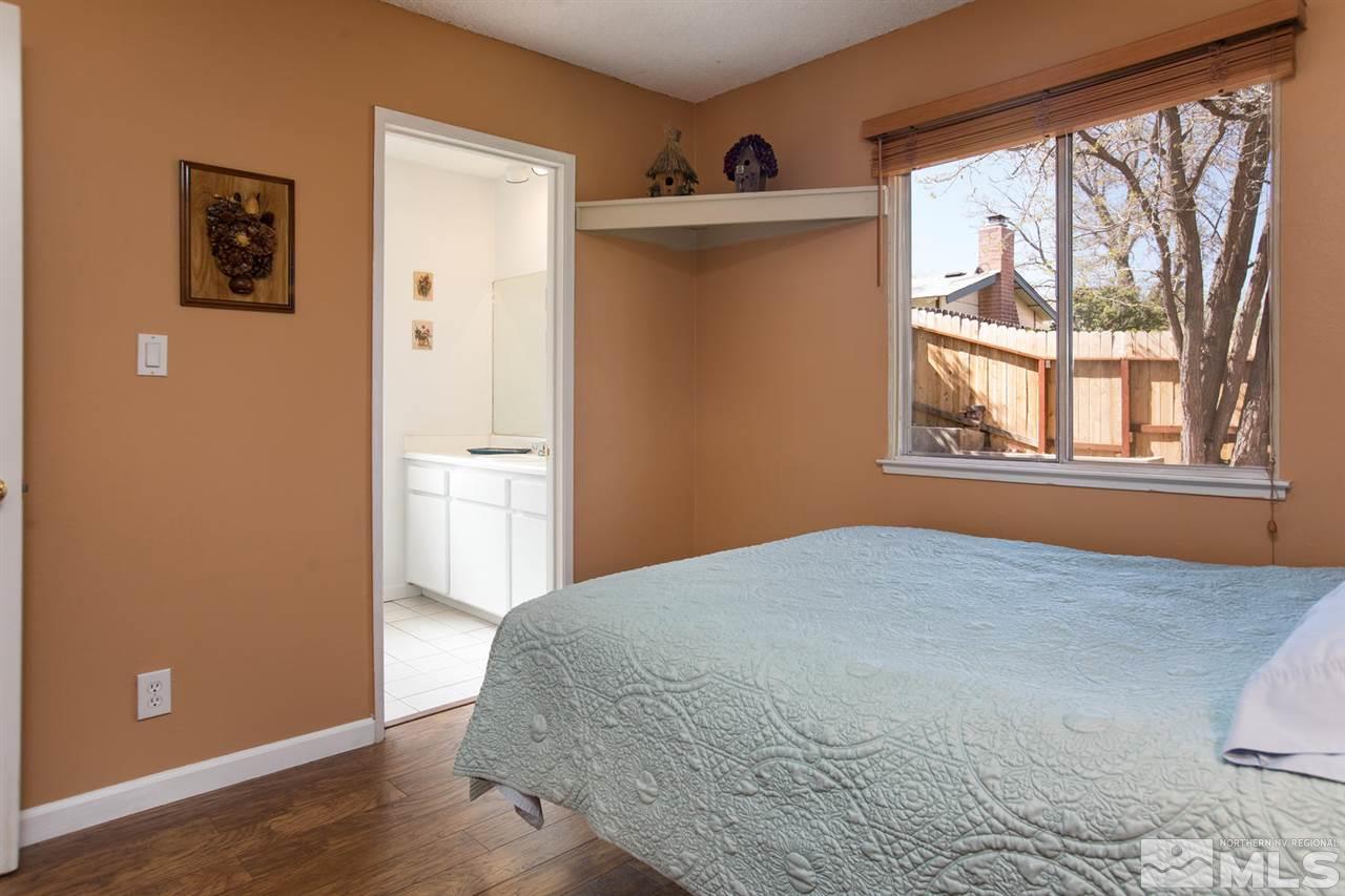 1845 Kings Row Reno, NV 89503 - Photo 18 of 25 a view of empty room with wooden floor and fan