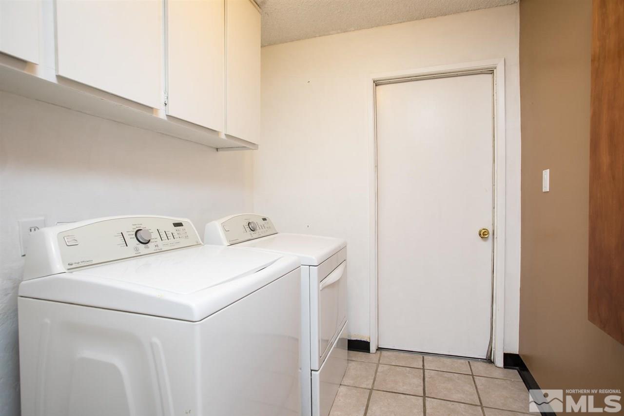 1845 Kings Row Reno, NV 89503 - Photo 21 of 25 a utility room with dryer and washer