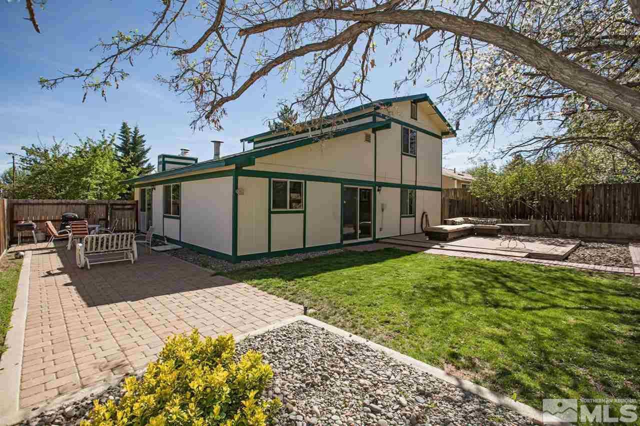 1845 Kings Row Reno, NV 89503 - Photo 24 of 25 a front view of a house with swimming pool