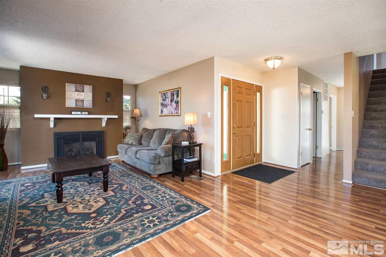 1845 Kings Row Reno, NV 89503 - Photo 3 of 25 a living room with furniture and a fireplace