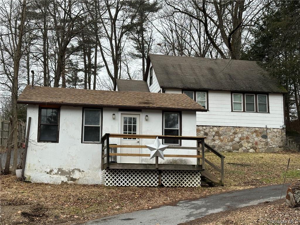 a front view of a house with garage