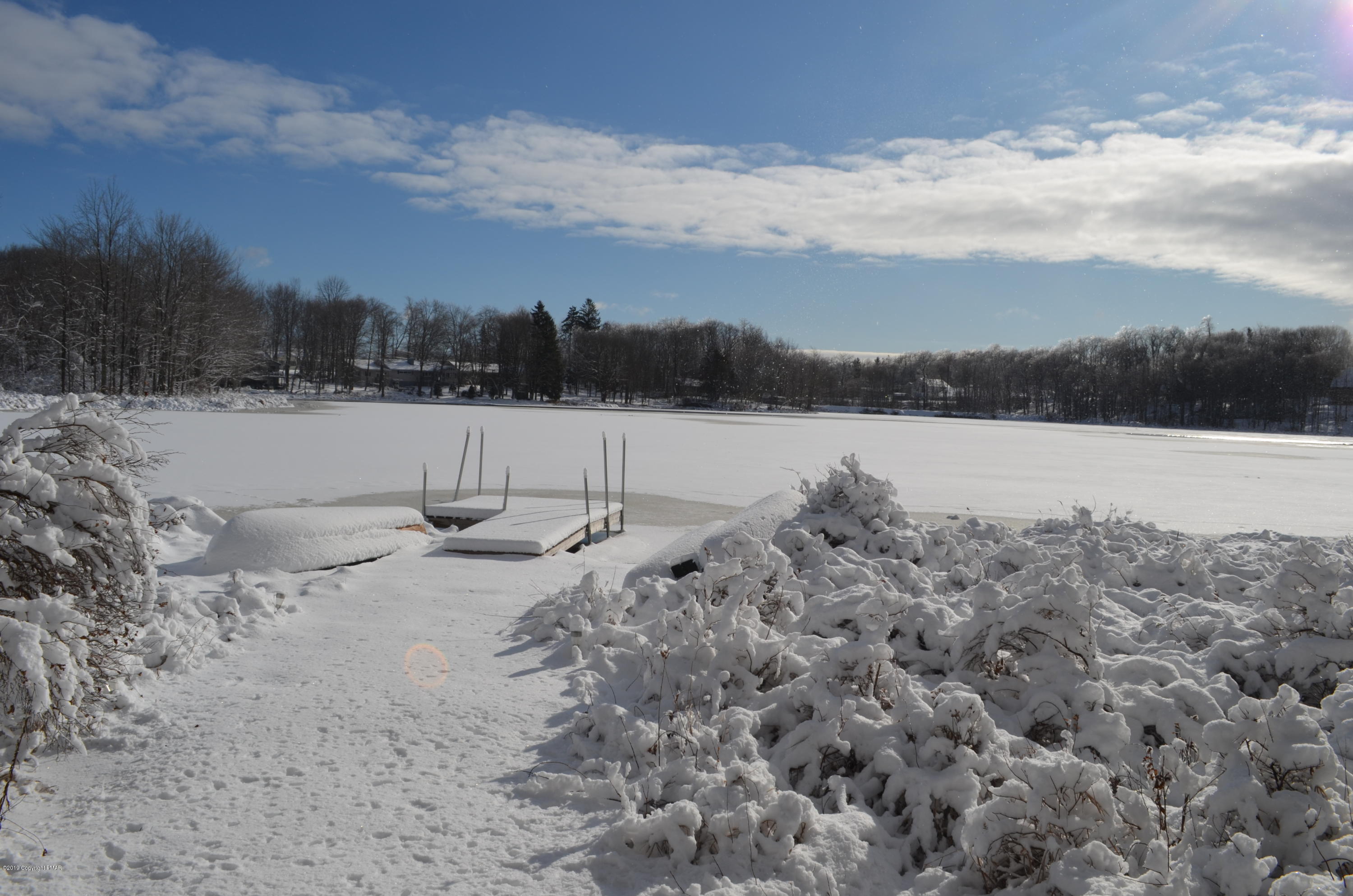 9 Birch Point Road Gouldsboro, PA 18424 - Photo 1 of 41 a view of a lake next to a building