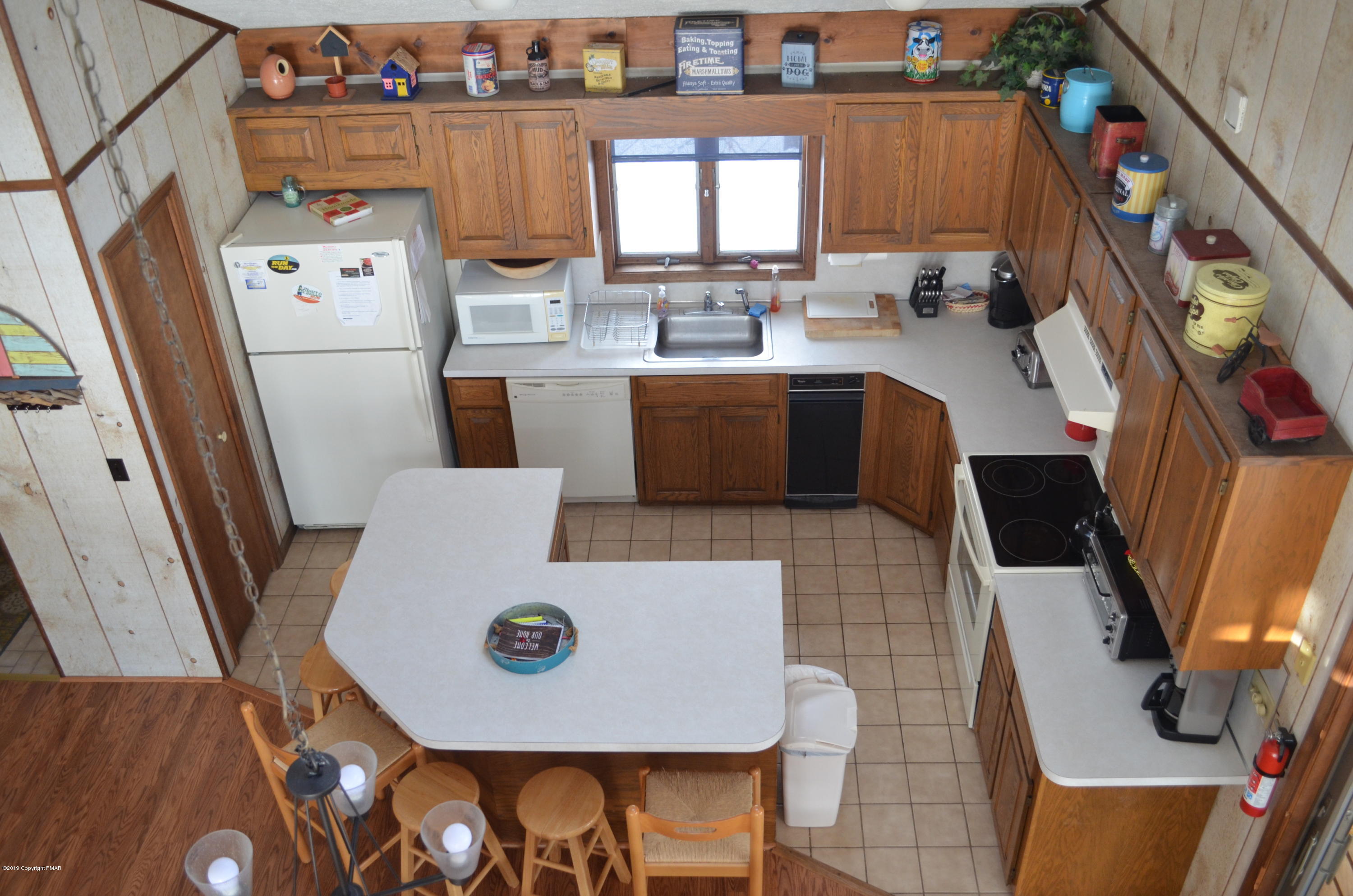 9 Birch Point Road Gouldsboro, PA 18424 - Photo 11 of 41 a dining room with furniture and a window