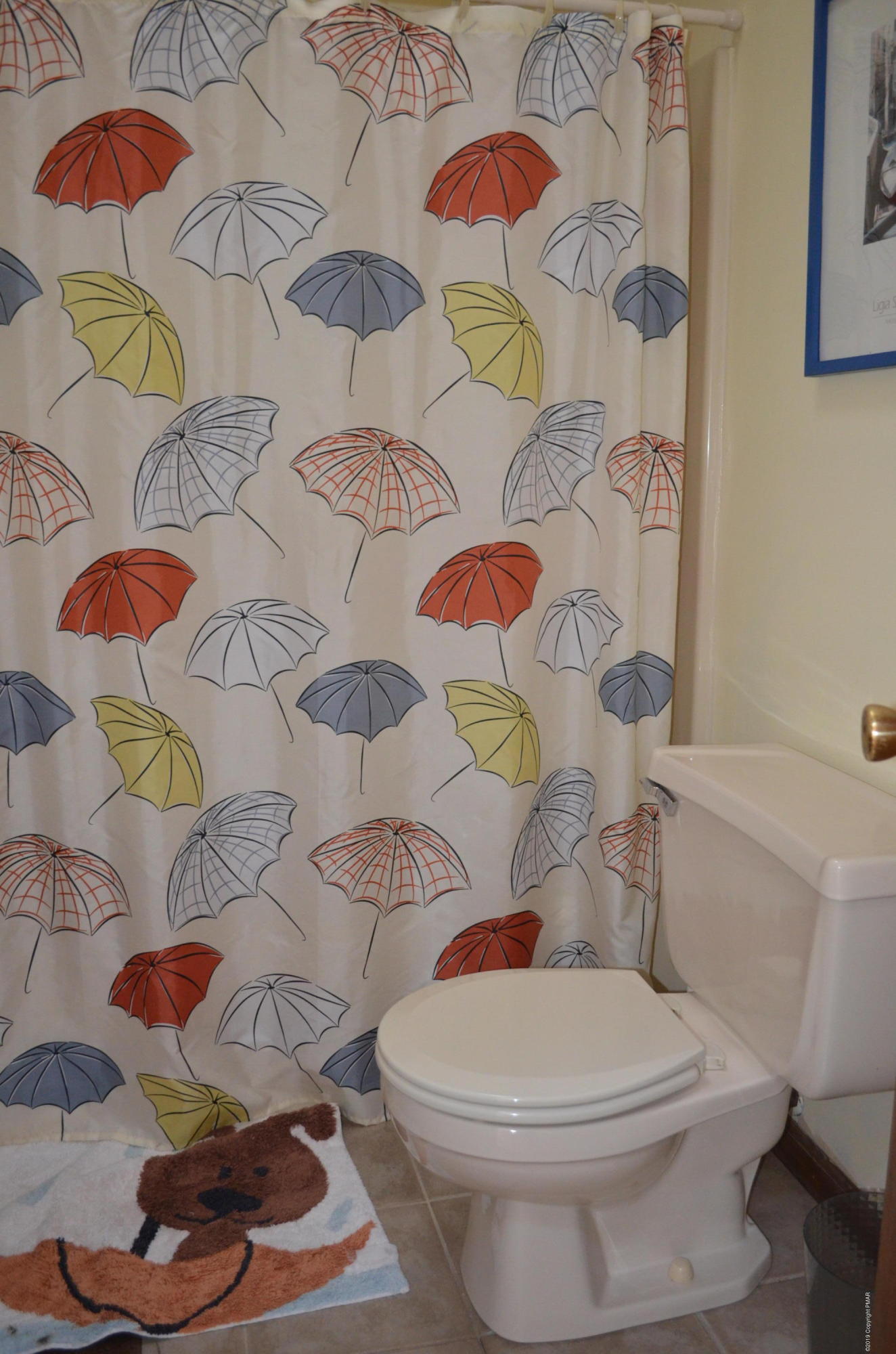9 Birch Point Road Gouldsboro, PA 18424 - Photo 29 of 41 a white toilet sitting next to a bath tub and a shower curtain