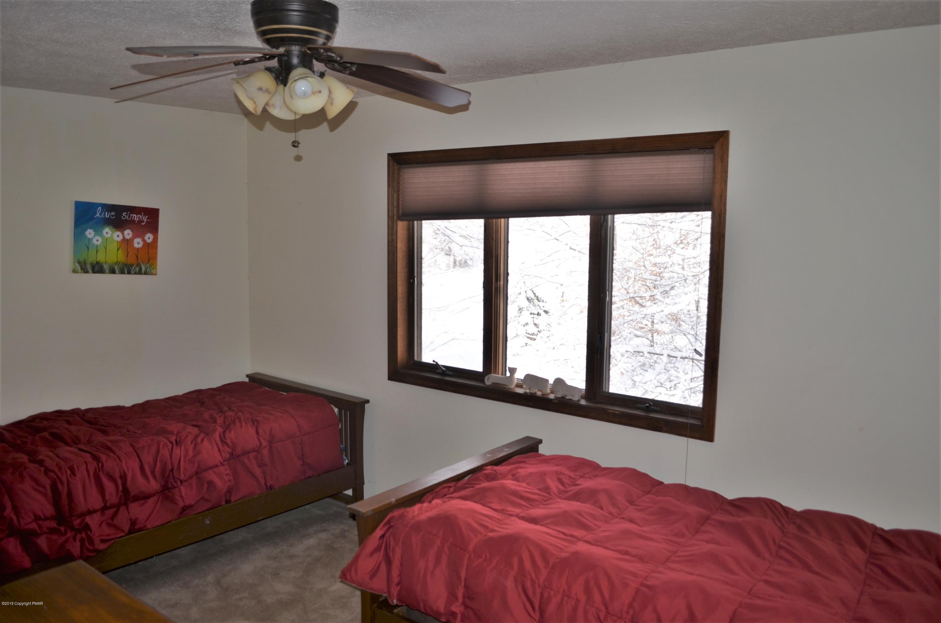 9 Birch Point Road Gouldsboro, PA 18424 - Photo 33 of 41 a bedroom with bed and window