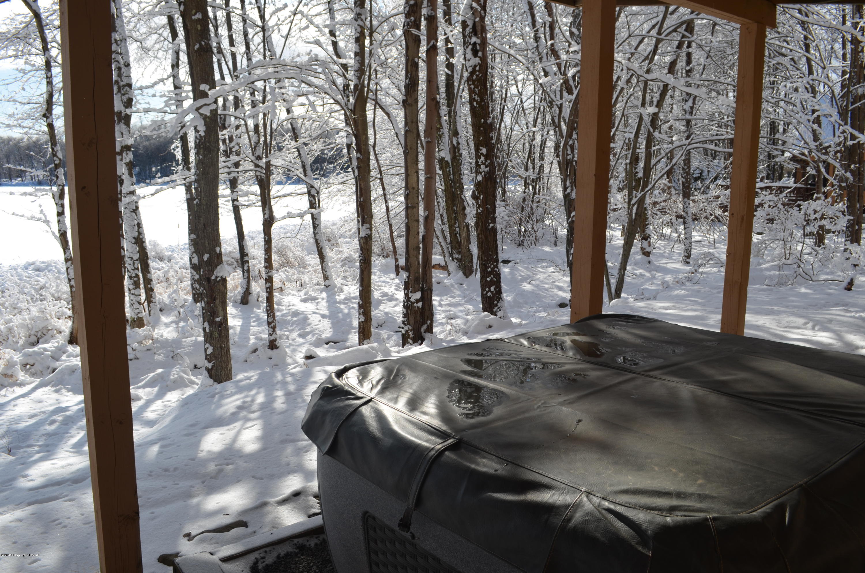 9 Birch Point Road Gouldsboro, PA 18424 - Photo 40 of 41 a table with chairs and a lake view
