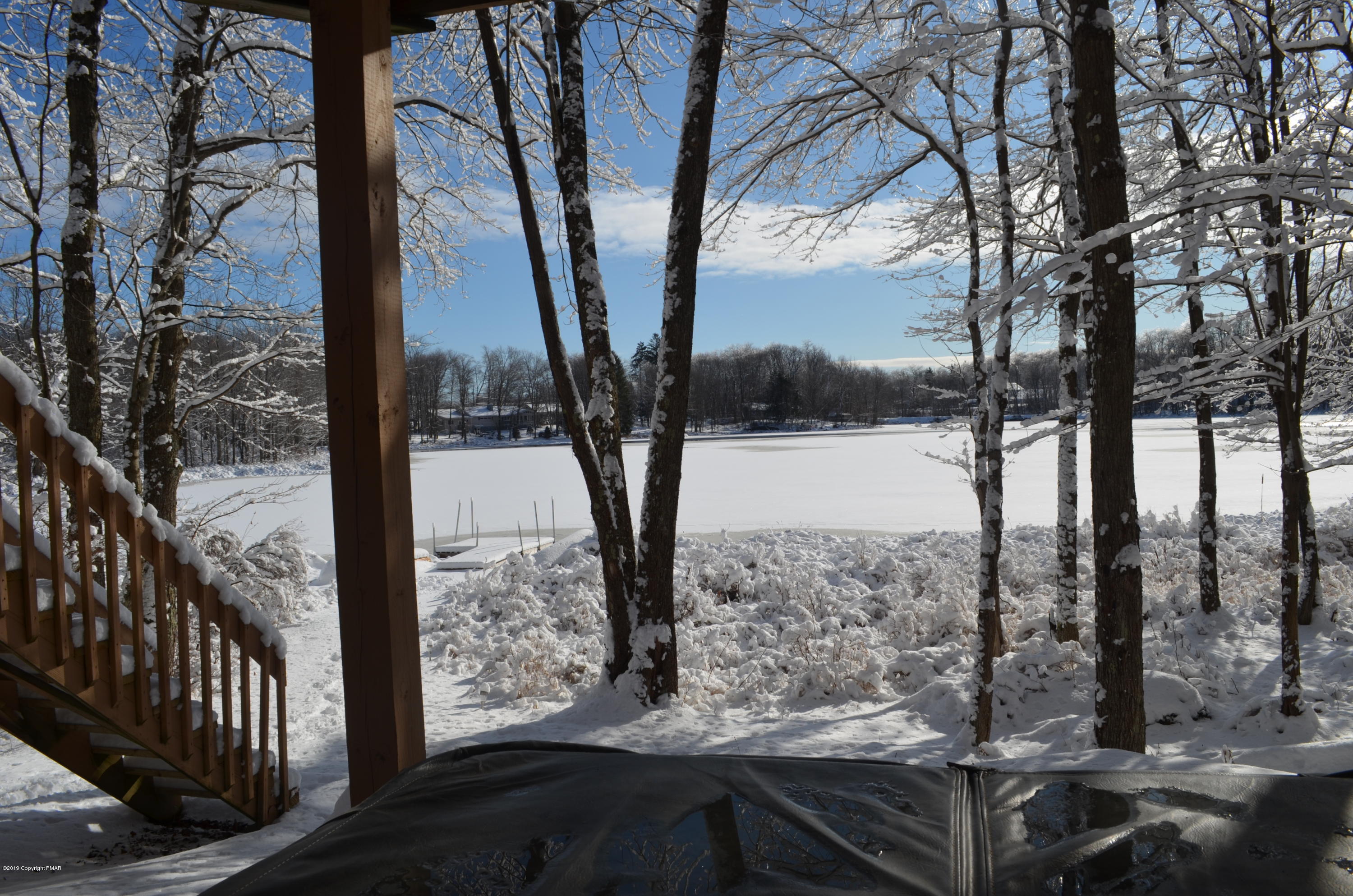 9 Birch Point Road Gouldsboro, PA 18424 - Photo 41 of 41 a view of a yard with wooden fence and large trees