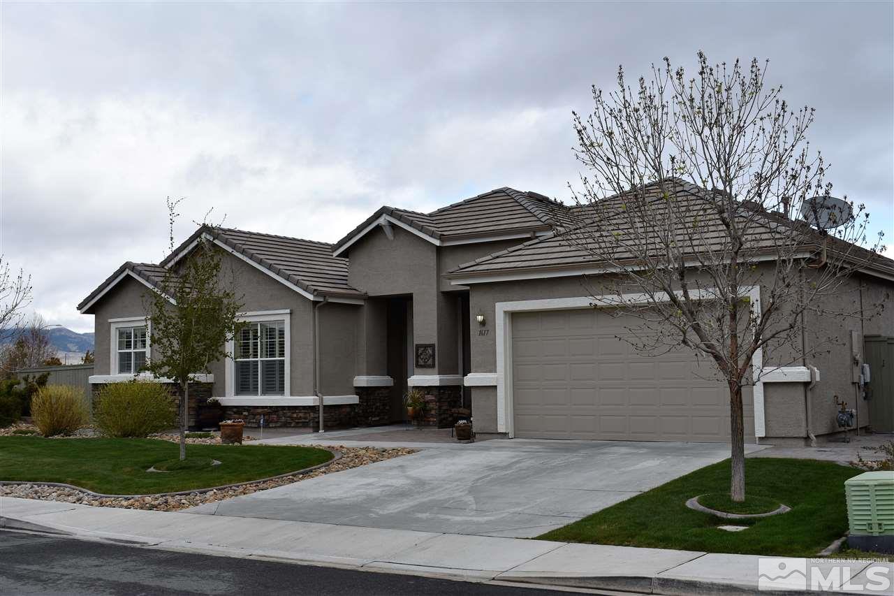 1617 Gemtown Drive Reno, NV 89521 - Photo 1 of 1 a front view of a house with garden