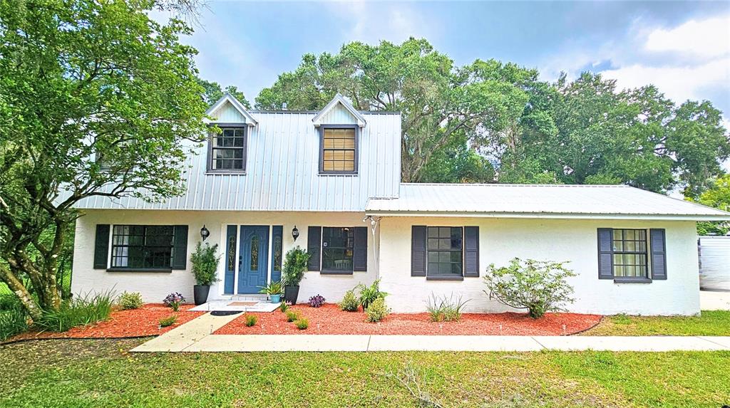 8602 Williams Road Seffner, FL 33584 - Photo 1 of 1 front view of a house with a yard