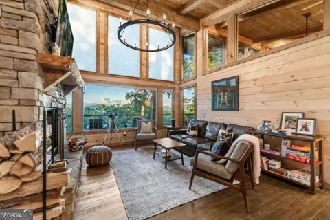 a view of a livingroom with furniture window and outside view