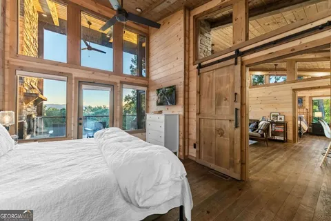 a bathroom with a bathtub and shower