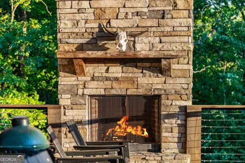 a view of a patio with wooden floor