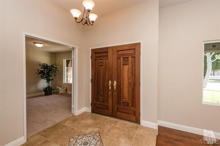 3025 Springfield Street Simi Valley, CA 93063 - Photo 2 of 24 wooden floor in an empty room with a mirror