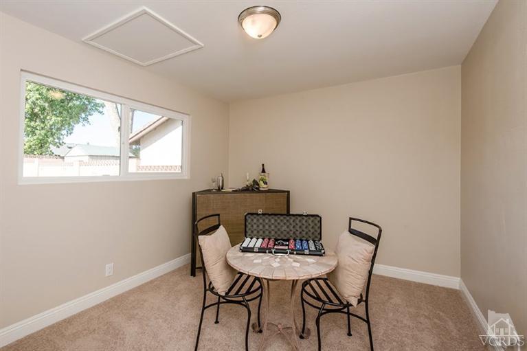 3025 Springfield Street Simi Valley, CA 93063 - Photo 13 of 24 a view of a room that has a table and chair in it