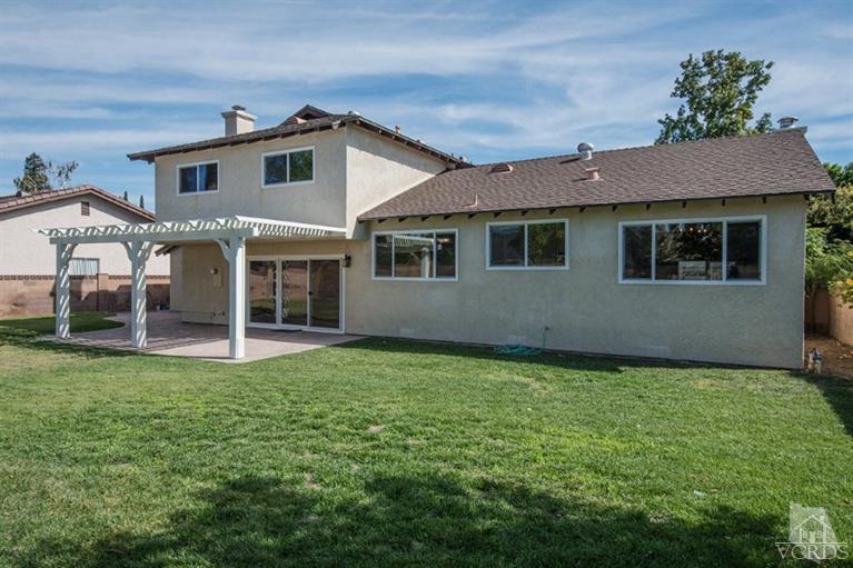 3025 Springfield Street Simi Valley, CA 93063 - Photo 22 of 24 a view of a house with a yard and a porch