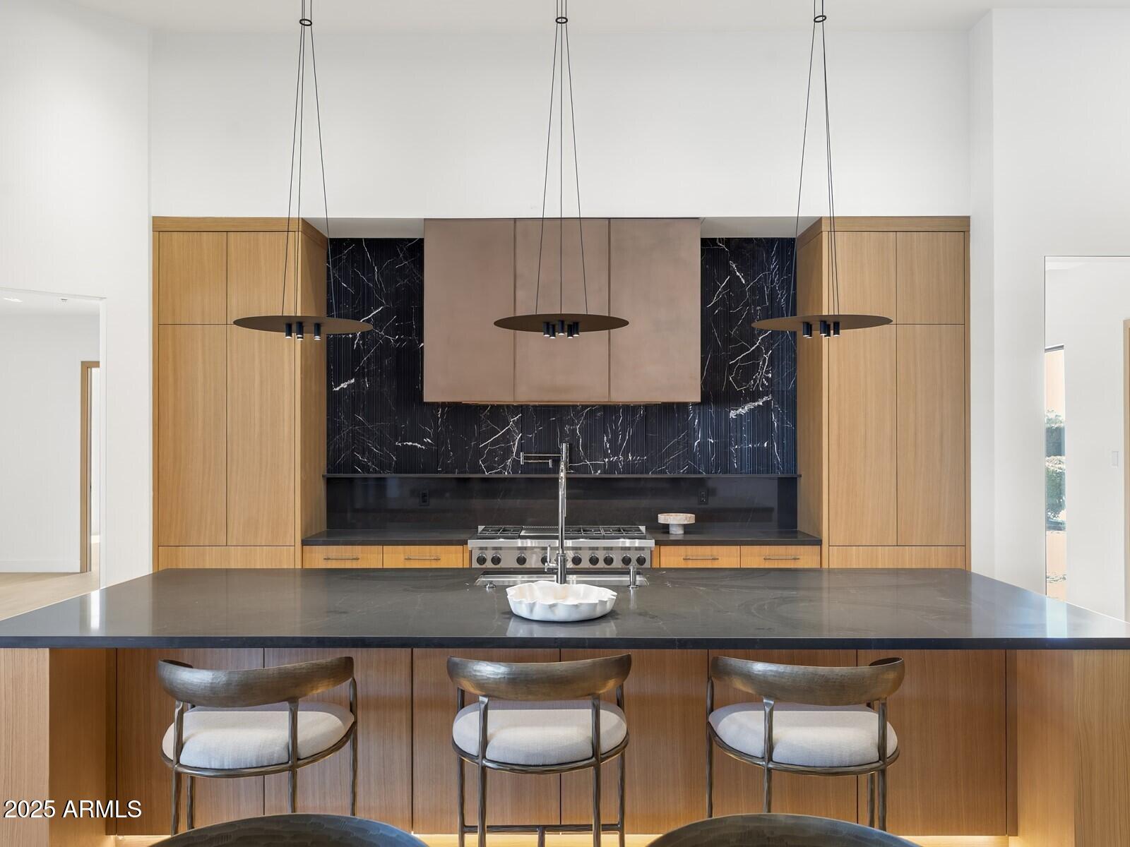 5305 North 68th Place Paradise Valley, AZ 85253 - Photo 17 of 65 a kitchen with a counter space and a refrigerator