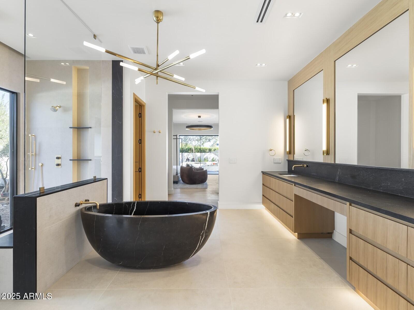 5305 North 68th Place Paradise Valley, AZ 85253 - Photo 37 of 65 a living room with furniture and a chandelier
