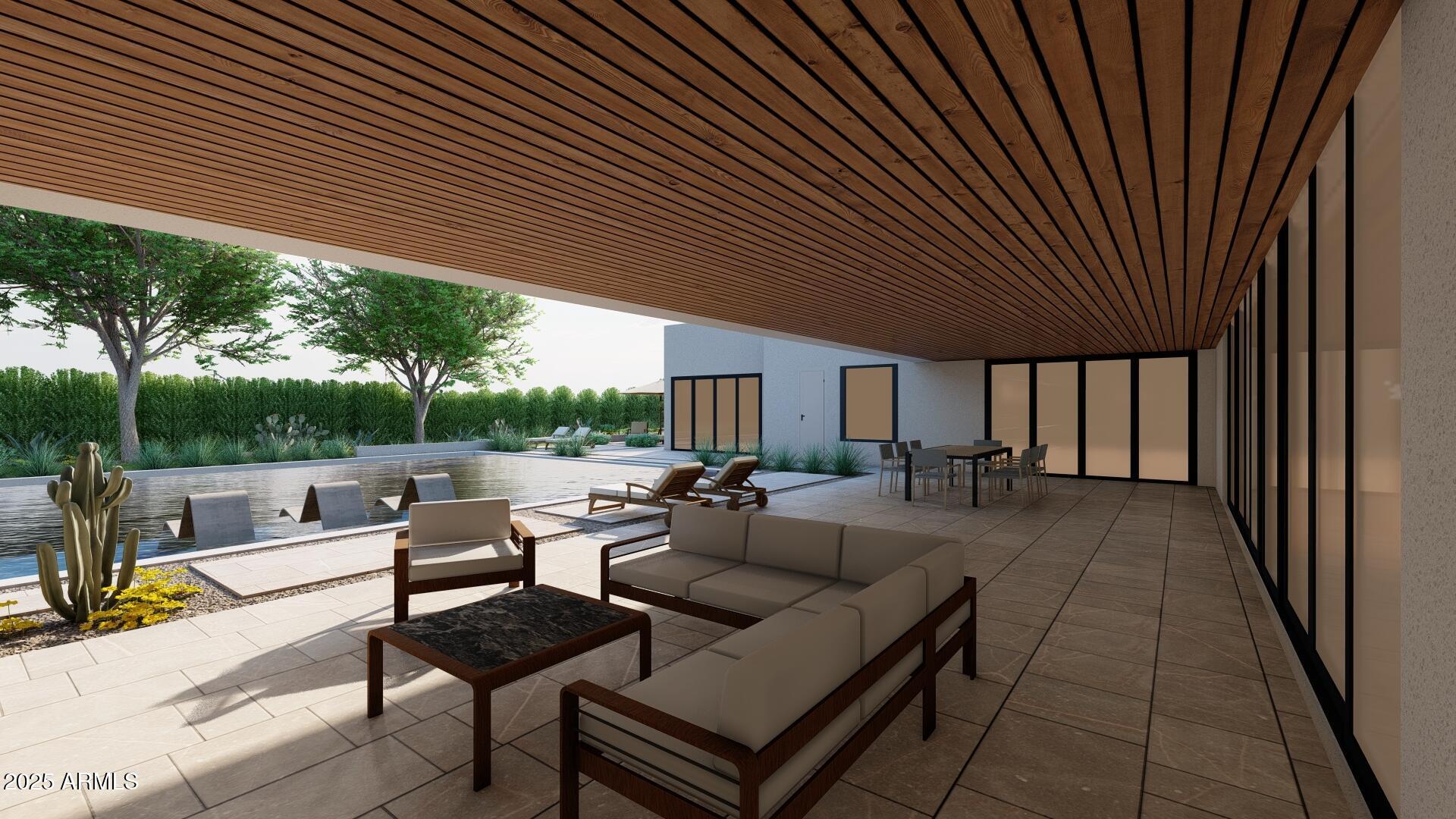 5305 North 68th Place Paradise Valley, AZ 85253 - Photo 53 of 65 a view of a patio with couches and pool