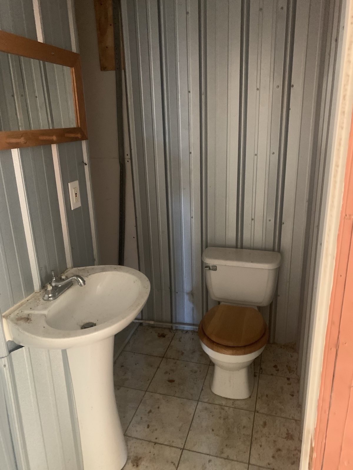 1252 Kelly Road Centerville, TN 37033 - Photo 19 of 34 a bathroom with a toilet and a sink