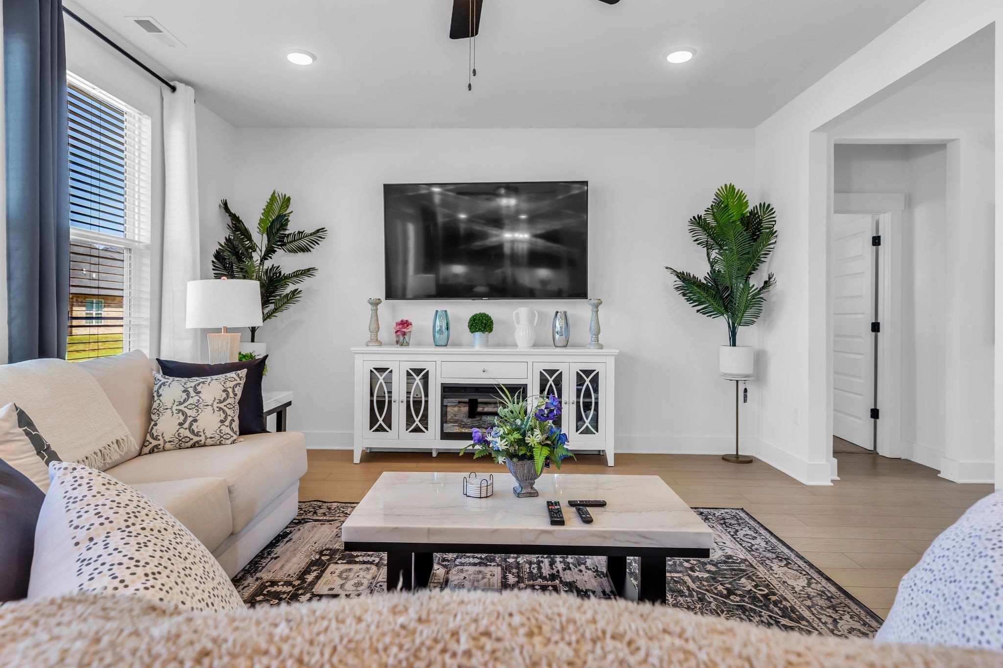 2404 Beaver Drive Murfreesboro, TN 37128 - Photo 11 of 42 a living room with furniture and a flat screen tv