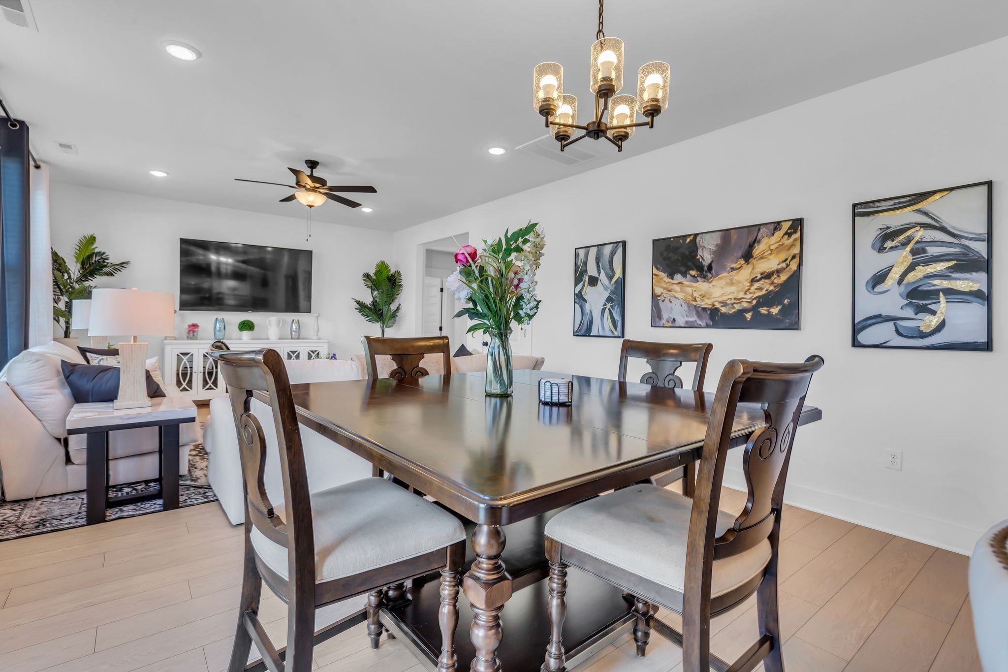 2404 Beaver Drive Murfreesboro, TN 37128 - Photo 13 of 42 a view of a dining room with furniture wooden floor and a chandelier