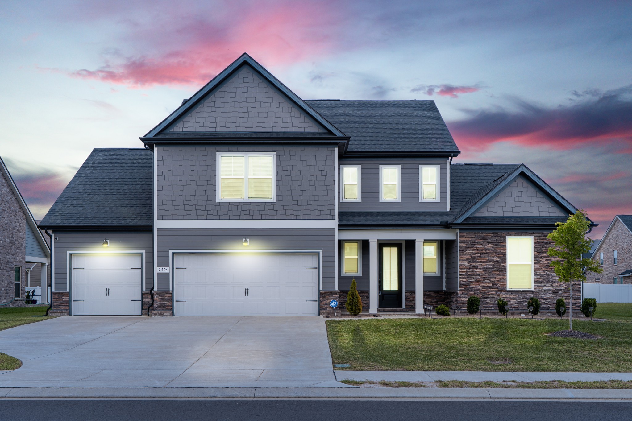 2404 Beaver Drive Murfreesboro, TN 37128 - Photo 2 of 42 a front view of a house with a yard