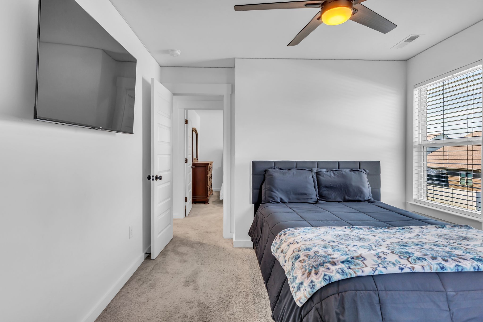 2404 Beaver Drive Murfreesboro, TN 37128 - Photo 34 of 42 a bedroom with a large bed and a window