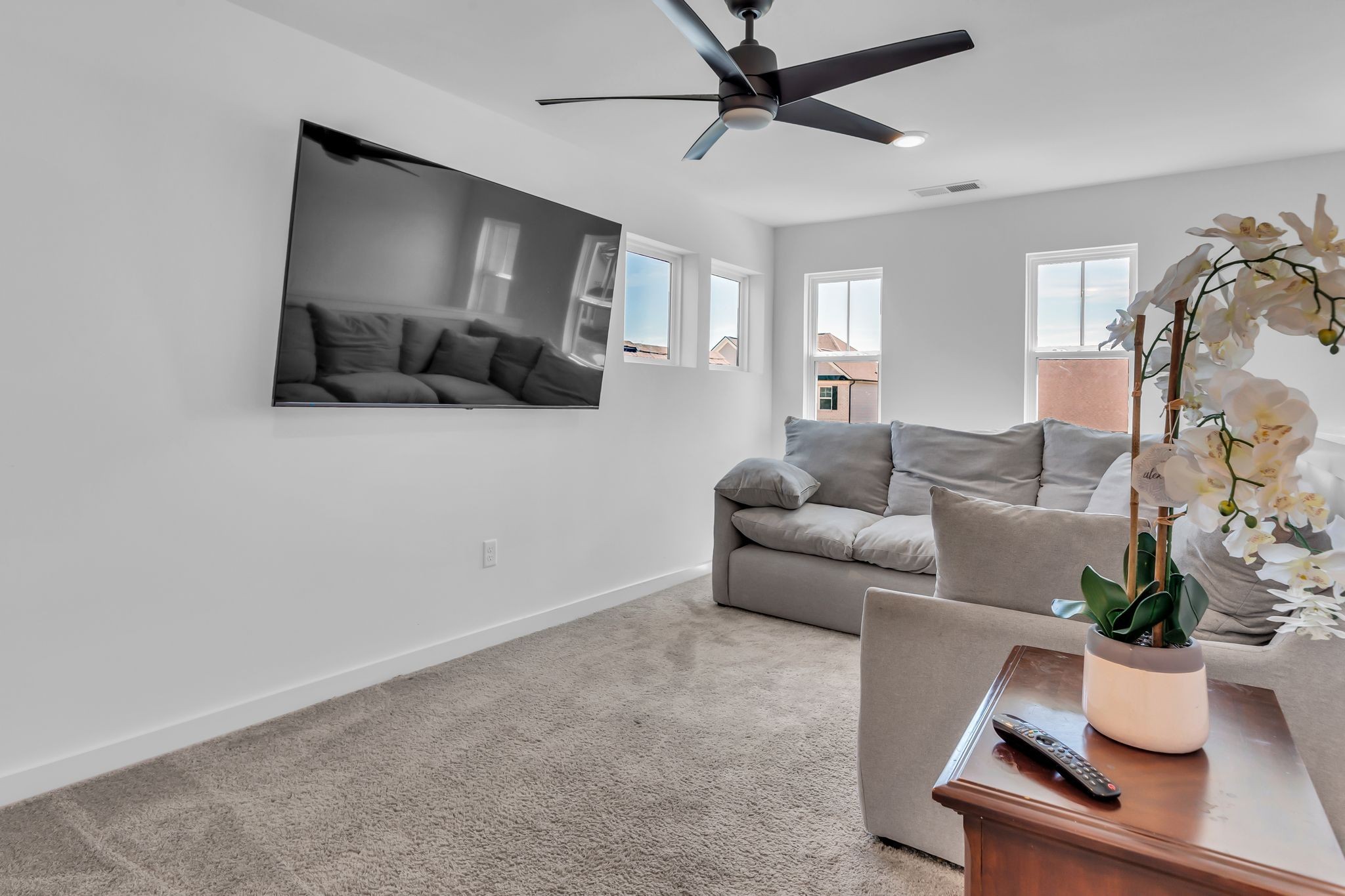 2404 Beaver Drive Murfreesboro, TN 37128 - Photo 35 of 42 a living room with furniture and a flat screen tv