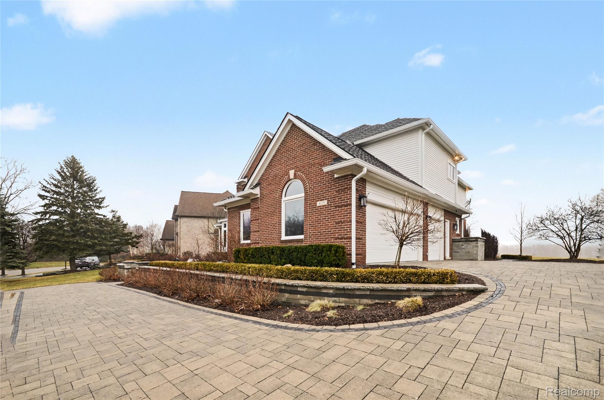 4179 St Andrews Street Howell, MI 48843 - Photo 51 of 75 Never worry about shoveling again with your heated driveway.
