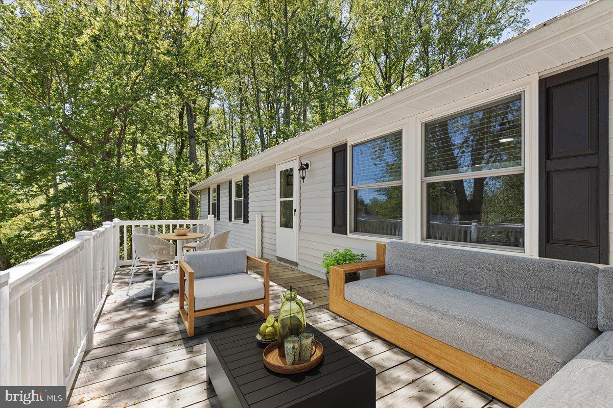 3719 3rd Street North Beach, MD 20714 - Photo 3 of 44 Great Deck off the Side- (Virtually Staged)