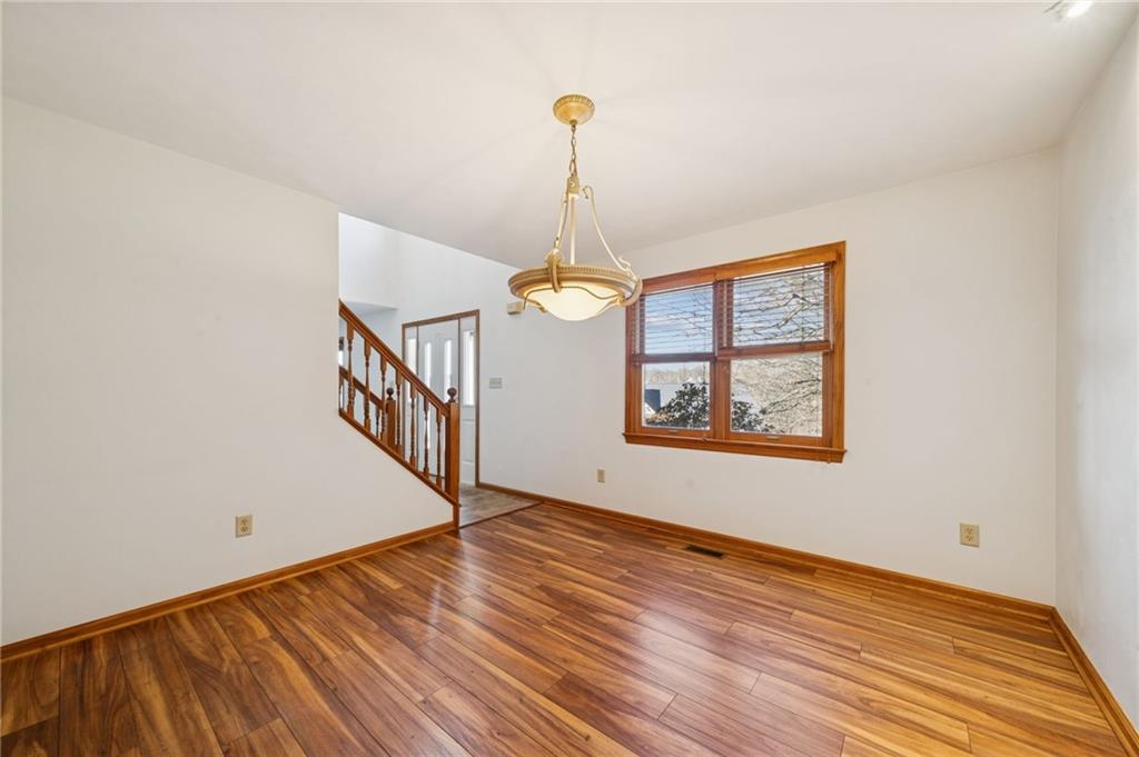 1051 Finchley Road Irwin, PA 15642 - Photo 18 of 36 a view of an entryway with wooden floor