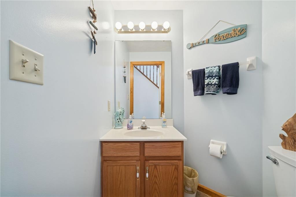 1051 Finchley Road Irwin, PA 15642 - Photo 20 of 36 a bathroom with a sink mirror and vanity