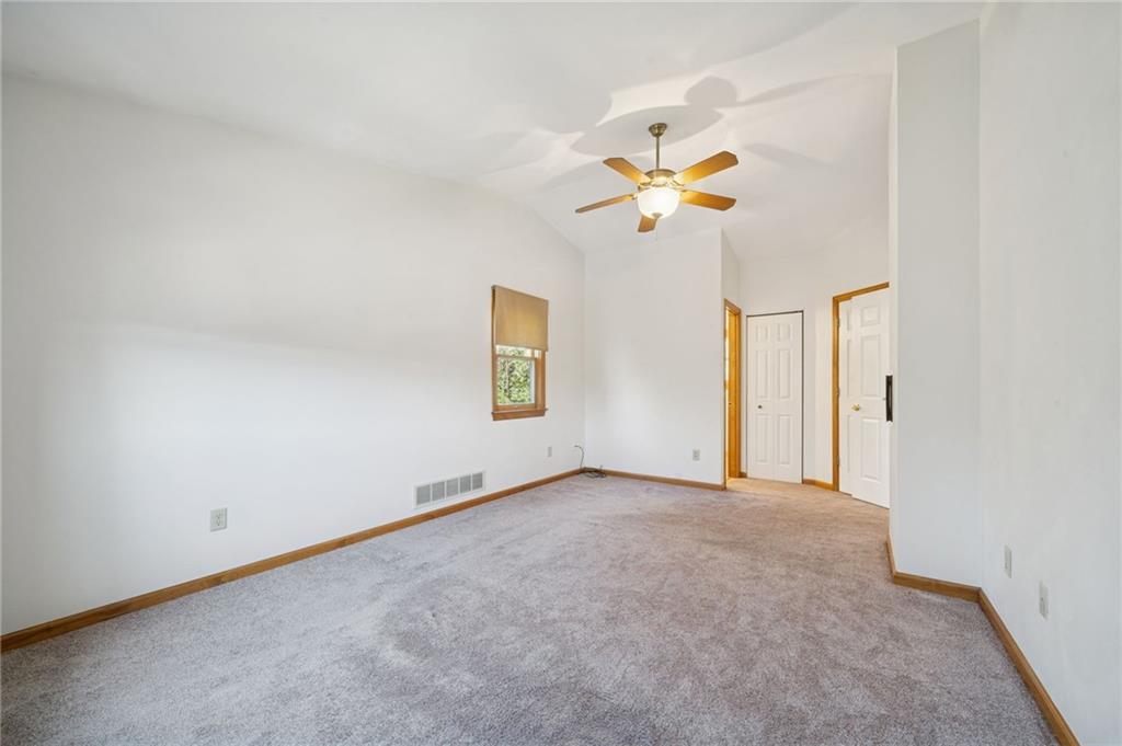 1051 Finchley Road Irwin, PA 15642 - Photo 22 of 36 an empty room with a window and a ceiling fan