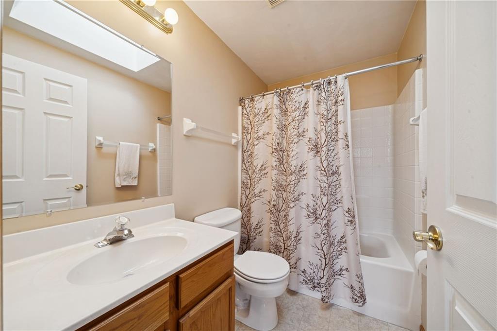 1051 Finchley Road Irwin, PA 15642 - Photo 29 of 36 a bathroom with a sink and a toilet