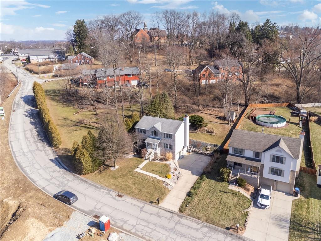 1051 Finchley Road Irwin, PA 15642 - Photo 34 of 36 an aerial view of a house with a swimming pool