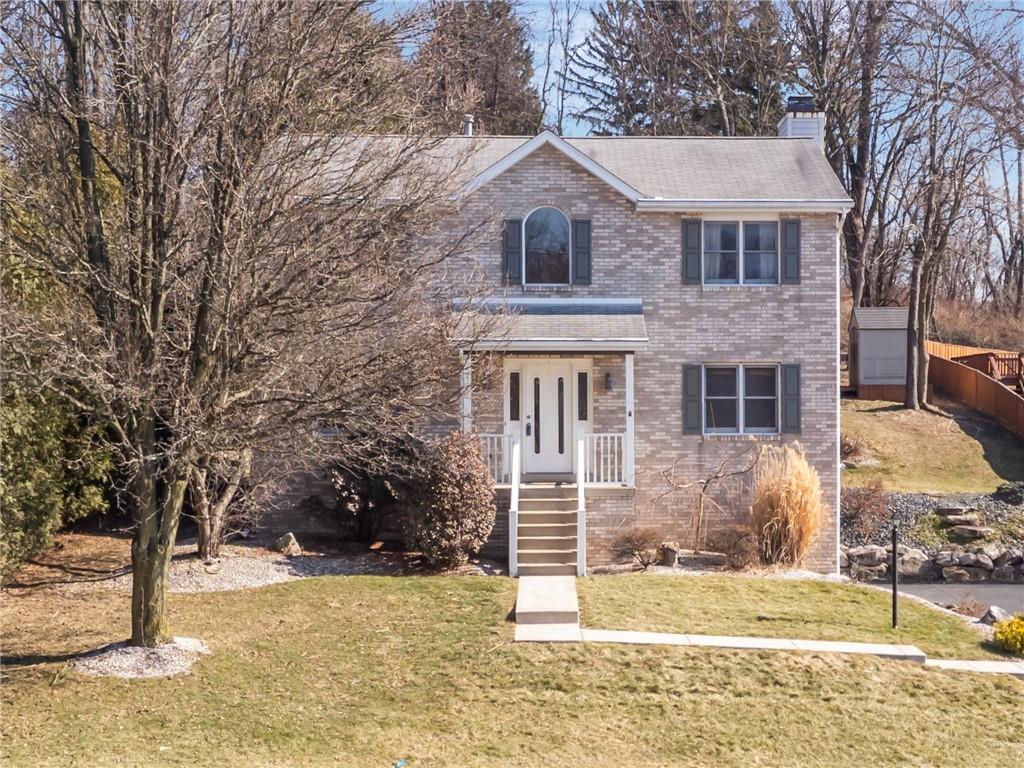 1051 Finchley Road Irwin, PA 15642 - Photo 36 of 36 a front view of a house with garden