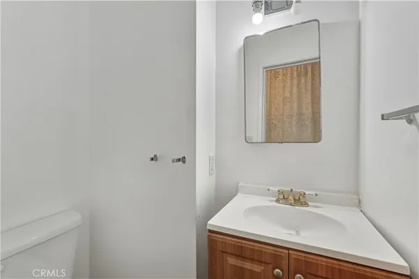 a bathroom with a sink and a vanity