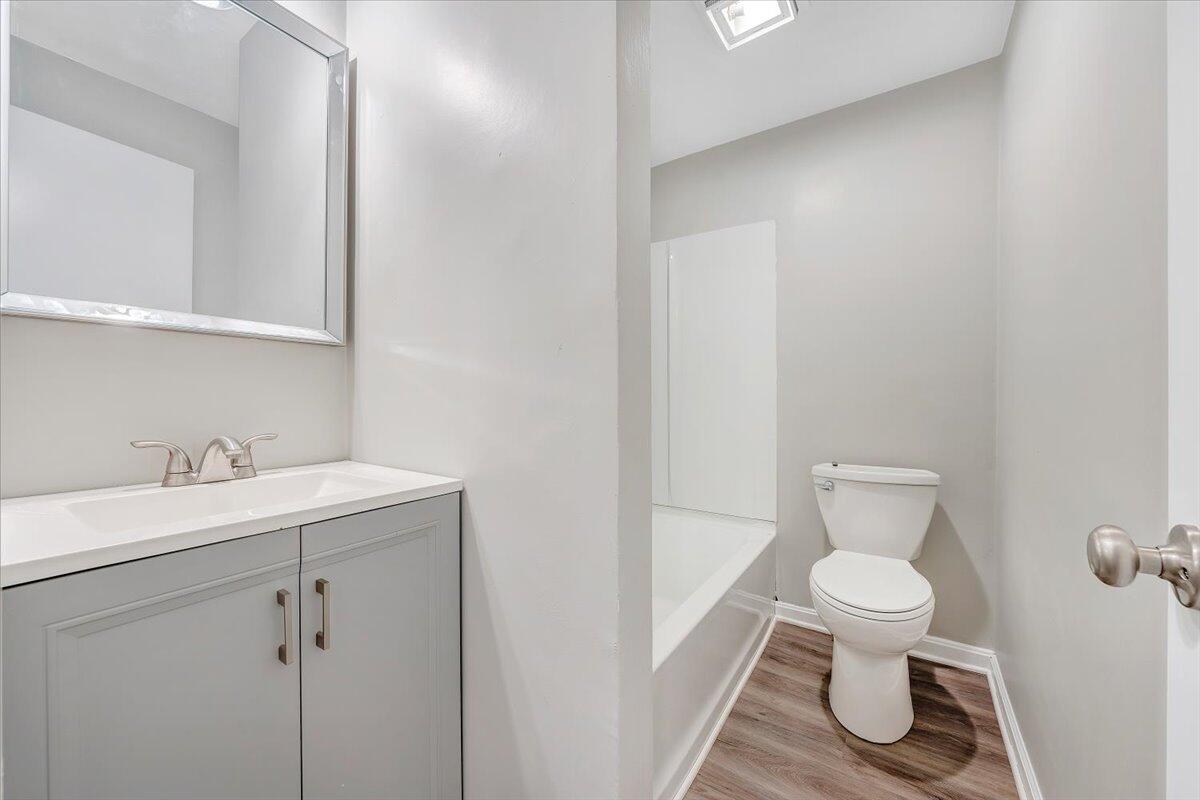 5679 Franklin Road Roanoke, VA 24014 - Photo 20 of 36 a bathroom with a toilet a sink and mirror