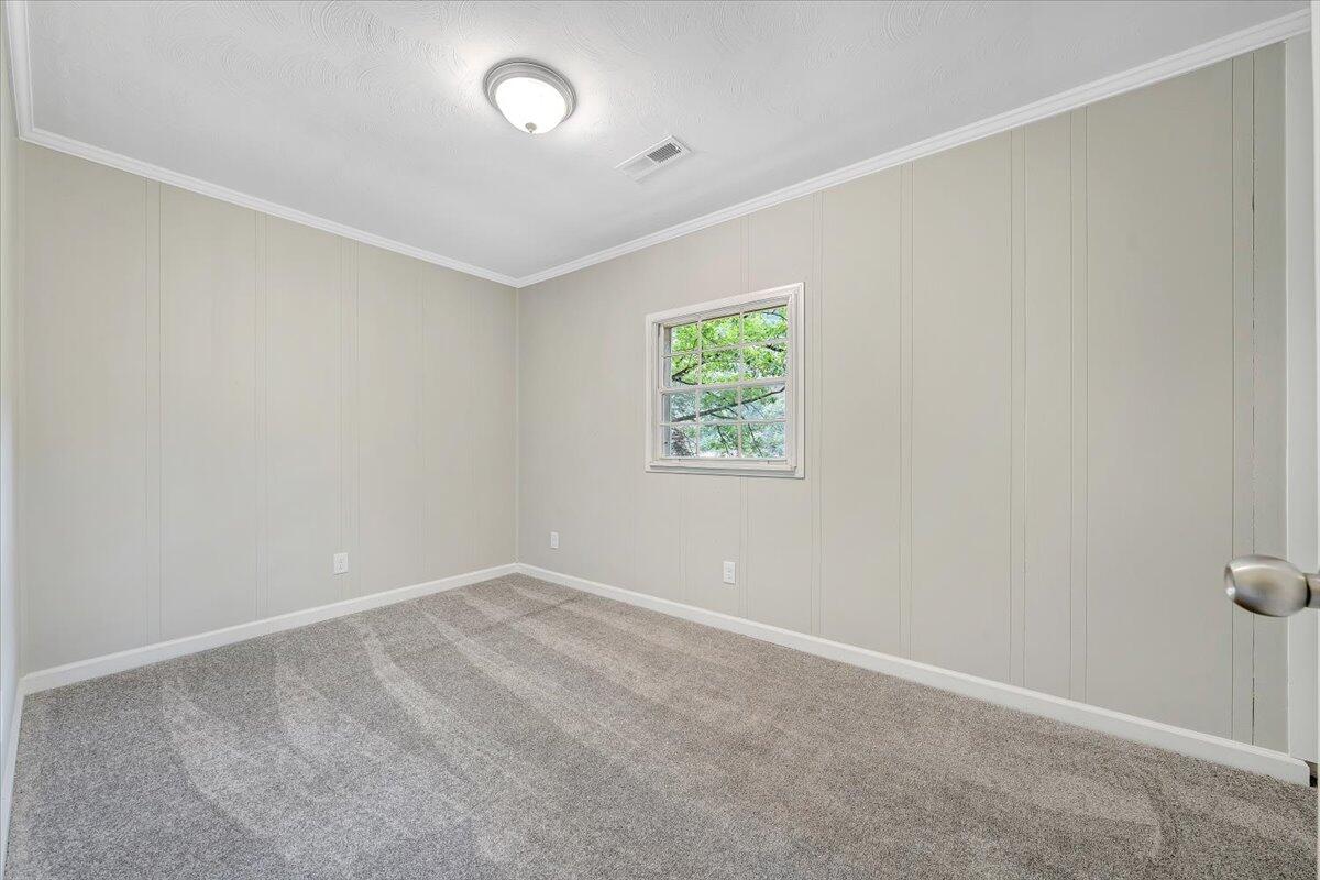 5679 Franklin Road Roanoke, VA 24014 - Photo 21 of 36 an empty room with windows