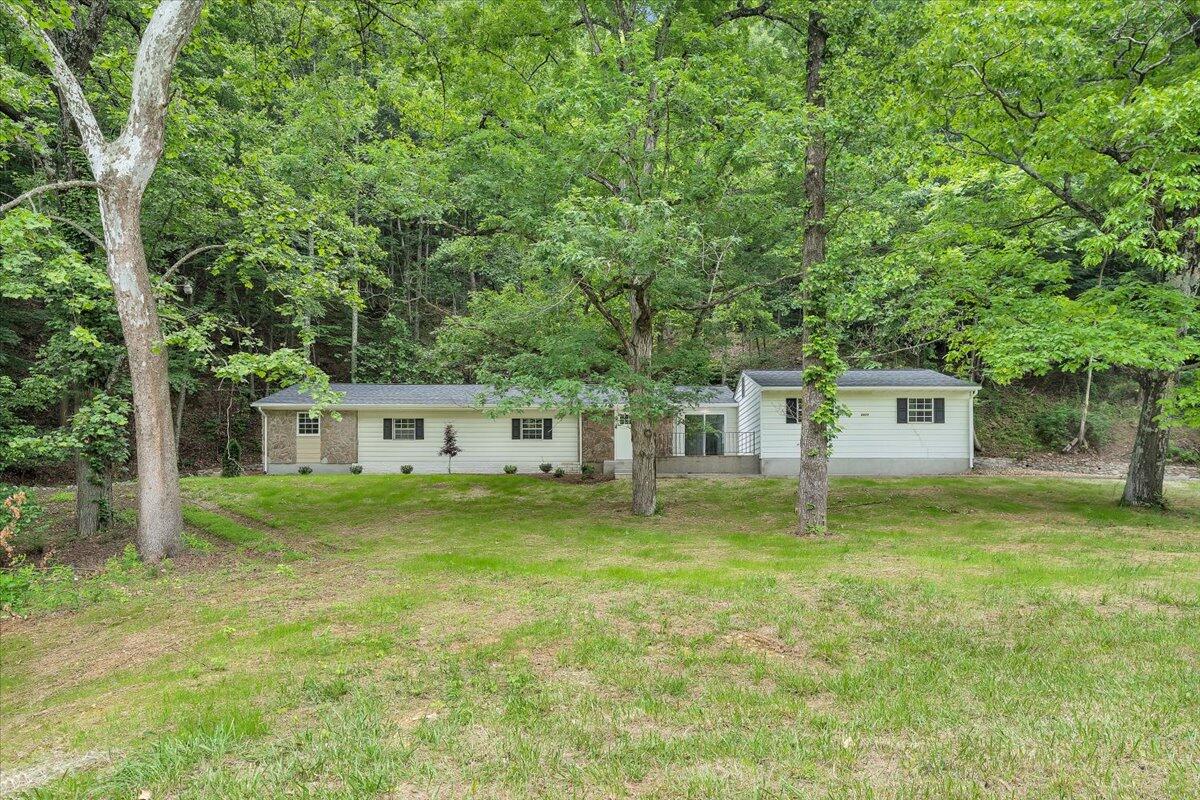 5679 Franklin Road Roanoke, VA 24014 - Photo 27 of 36 front view of a house with a yard