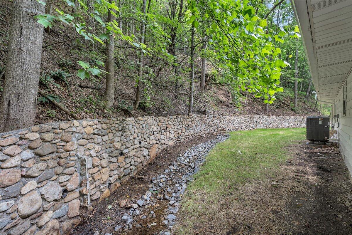 5679 Franklin Road Roanoke, VA 24014 - Photo 29 of 36 a view of a yard with plants and large trees