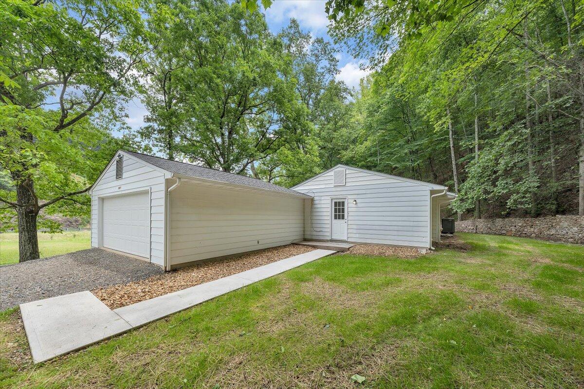 5679 Franklin Road Roanoke, VA 24014 - Photo 31 of 36 a view of a backyard with a large tree