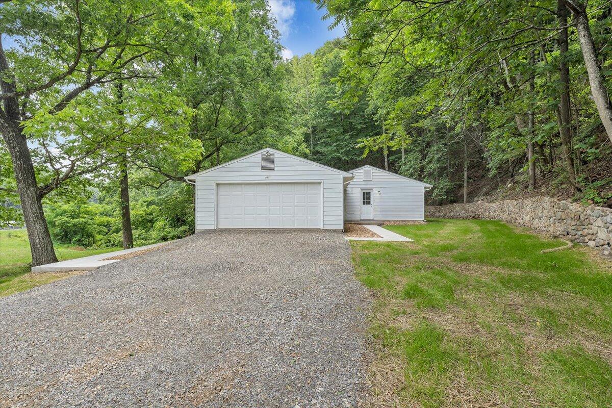 5679 Franklin Road Roanoke, VA 24014 - Photo 32 of 36 a house view with a garden space